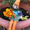 Personnage articulé lutin musicien